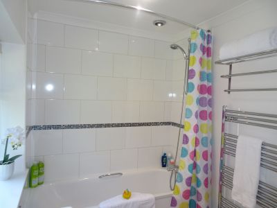 Spacious Bathrooms with Shower over Bath