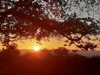 sunset over alpine Park cottage devon